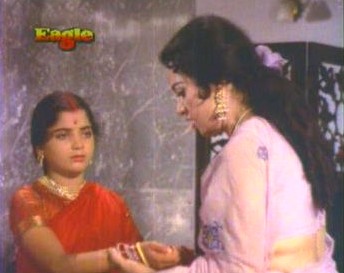 Ratna, aghast at Rupa's condition