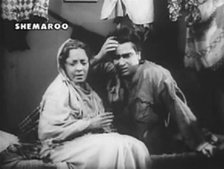 Ramu's mother badgers him Ramu's mother badgers him