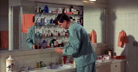George at the medicine cabinet