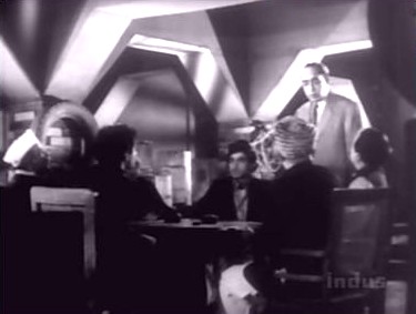 The merchants threaten Khanna and demand their money