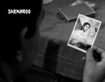 Havildar Ram Singh looks at his fiancee's photo - Kamli