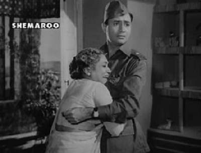 Major Verma's mother mistakes Anand for her son Major Verma's mother mistakes Anand for her son