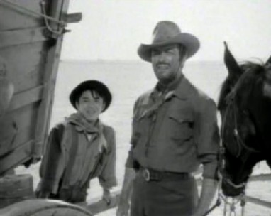 Robert Taylor with Henry Nakamura in Westward the Women