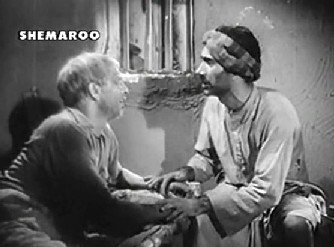 The old rickshaw-puller promises to help Shambhu 