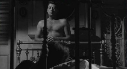Mitchum as Max Cady in Cape Fear Mitchum as Max Cady in Cape Fear