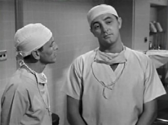 Mitchum as Lucas Marsh in Not As A Stranger Mitchum as Lucas Marsh in Not As A Stranger