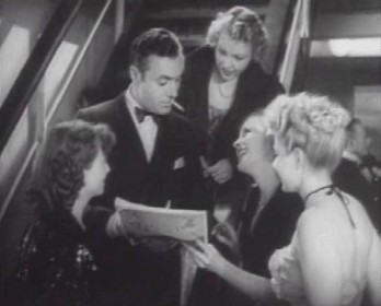 The girls flock around Michel The girls flock around Michel