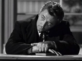 Mitchum as Harry Powell in The Night of the Hunter Mitchum as Harry Powell in The Night of the Hunter