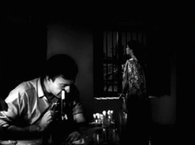 Nirmal slogs away in his little lab Nirmal slogs away in his little lab