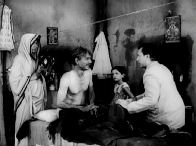 Ranu looks on while Nirmal attends to patients Ranu looks on while Nirmal attends to patients