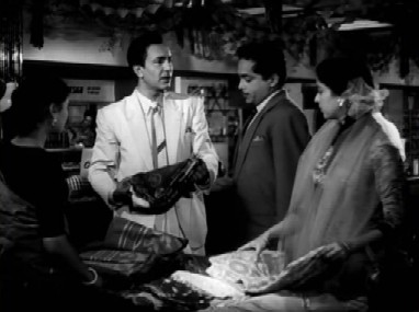 Flashback: Anuradha meets Nirmal at a sari store Flashback: Anuradha meets Nirmal at a sari store