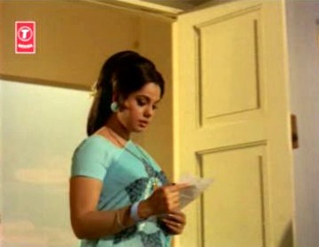 ...as she reads 'Mohan's' letter