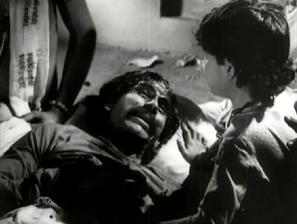 Baiju's father extracts a promise of revenge from Baiju