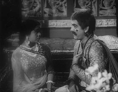 Radha discovers Mohan behind yet another disguise