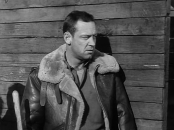 William Holden as JJ Sefton in Stalag 17