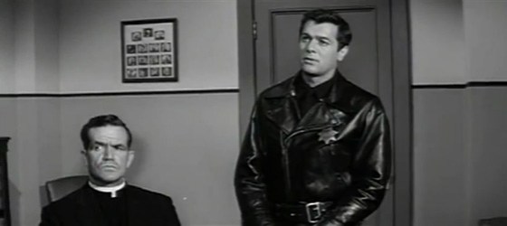 Joe comes to Kilrain's office while Father Guiseppe is being questioned