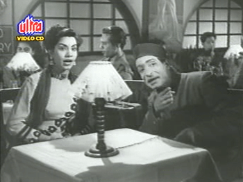 A 'palmist' joins Indra at her table