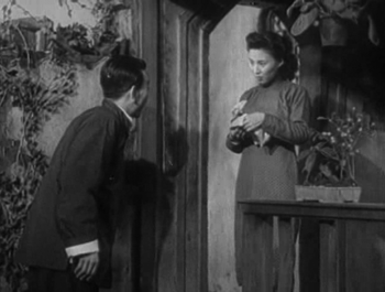 Lao Huang informs Yuwen of the guest's arrival