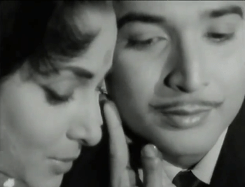 Waheeda Rehman and Biswajeet as Raj and Amit