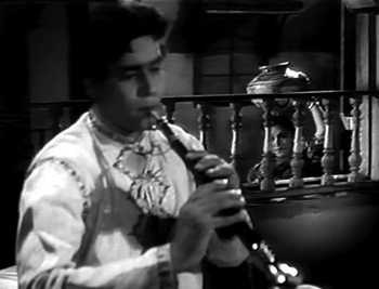 Gopi, enchanted by Kishan's shehnai