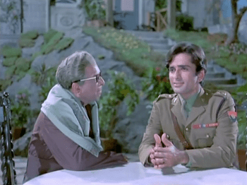 Foster-father and -son discuss Ajit's love life