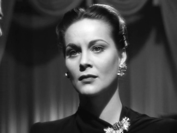 Mrs Paradine takes her arrest in her stride...