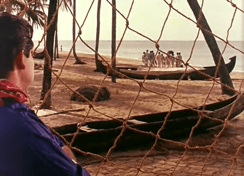 Pareekutty watches as the wedding party leaves