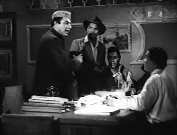 Mr Khanna tries to intervene, but is interrupted by Parker