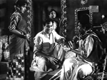 Basanti and Radha, with Kaka and Chandan