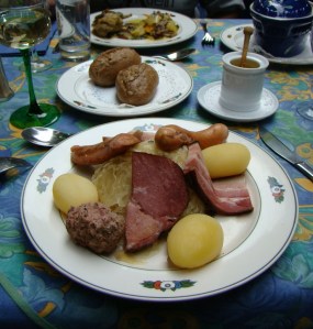 Typically Alsatian food: sauerkraut, meat and potatoes, at a cafe in Petite France