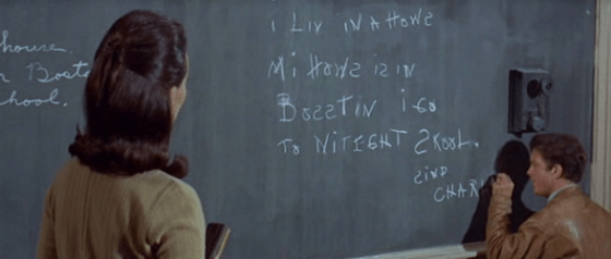 Mrs Kinian teaches Charly at night school