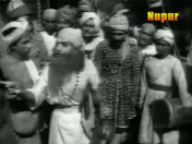 A spy poses as a mendicant...