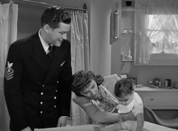 Elizabeth tries to handle the baby