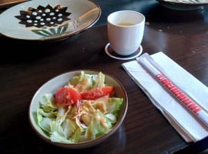 Two of the most disappointing things we consumed: a tasteless green tea and a frightful salad.