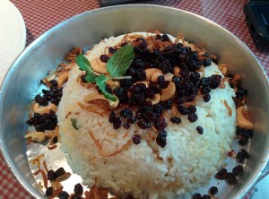 Mutton berry pulao, garnished with currants, fried onions and cashewnuts.