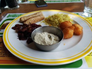 Breakfast at Citrus: poha, aloo bondas, coconut chutney - and bacon and sausages!