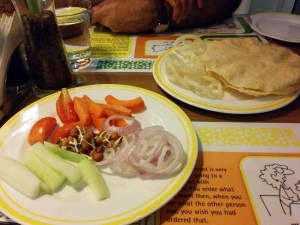 Complimentary starters at Citrus: salad and papads.