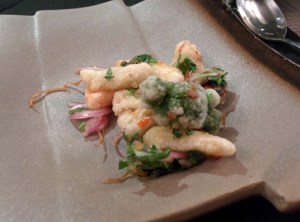 A crispy fried vegetable salad, drizzled with a sweet-sour-hot dressing.