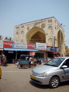 Just outside the fort (rather, outside the inner fortifications). 