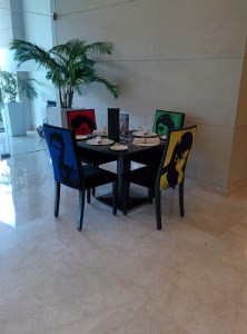 In the lobby at Lemon Tree Premier: furniture from Kebab Theater.