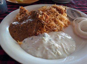 Biryani with mirchi ka salan and raita at Pista House.