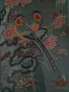 Detail from an embroidered panel in the Chinese Gallery.