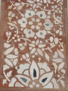 White and black marble inlay on red sandstone, at a gate in Sikandra.