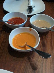 Chutneys at Yeti: a fiery red chilli one, a deceptively mild-looking peanut one, and a lovely, gentle sesame seed one.