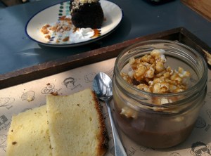 The chocolate pot de creme, topped with caramel popcorn and served with lemon poppy seed cake.