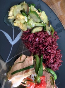 Main course at Rosang Cafe: bai (a veggie stew); wild red rice; and arsa chhum (a chicken stew).