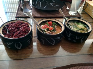 Our main course, lined up: wild red rice, arsa chhum, and bai.
