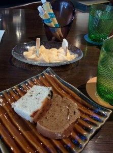 A complimentary coconutty something; breads and butter.