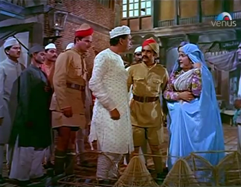 Achhan is arrested on a trumped-up charge