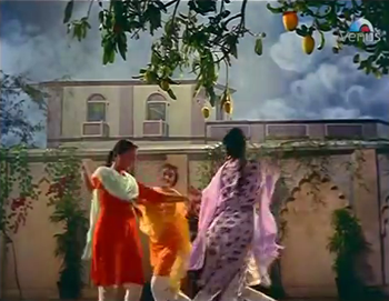 Zeenat and her friends cavort under a mango tree